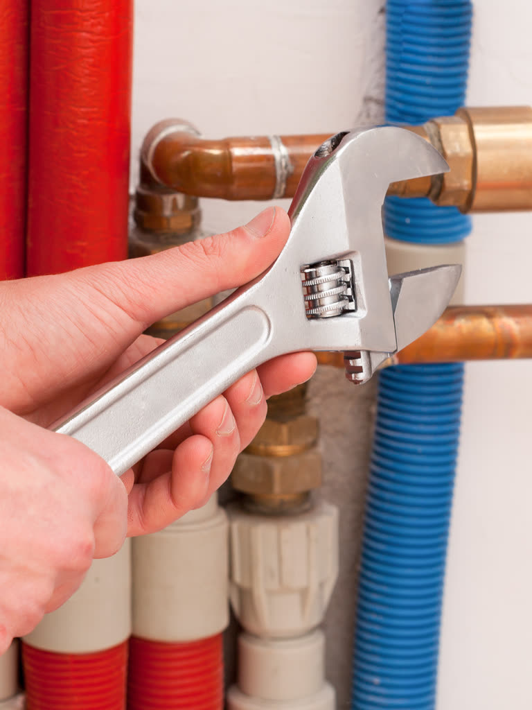 Electrical rough-in with conduit runs and device boxes in a framed wall